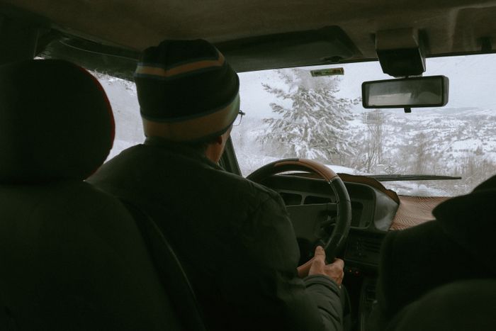 A man driving a car