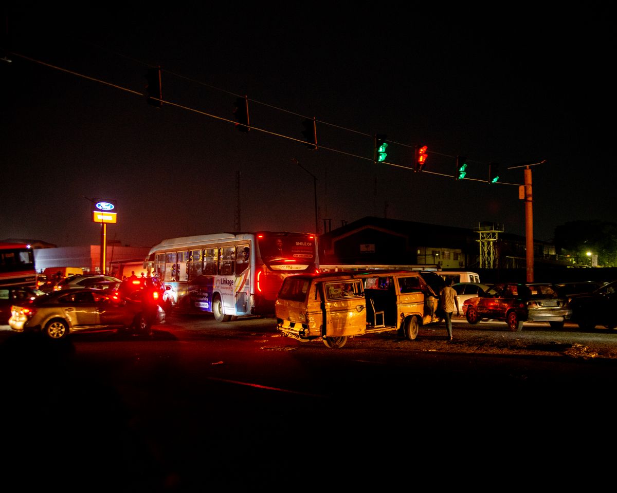 A crowded urban nighttime scene