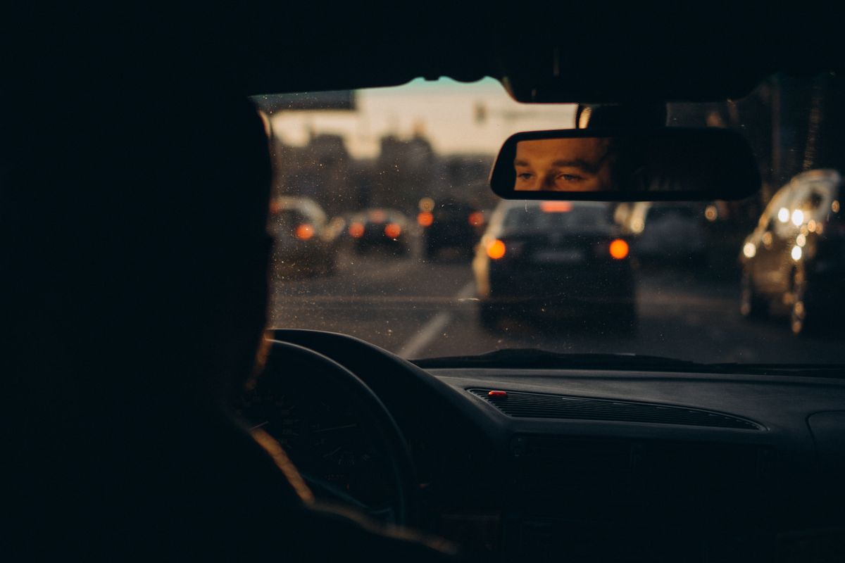 Man driving in traffic