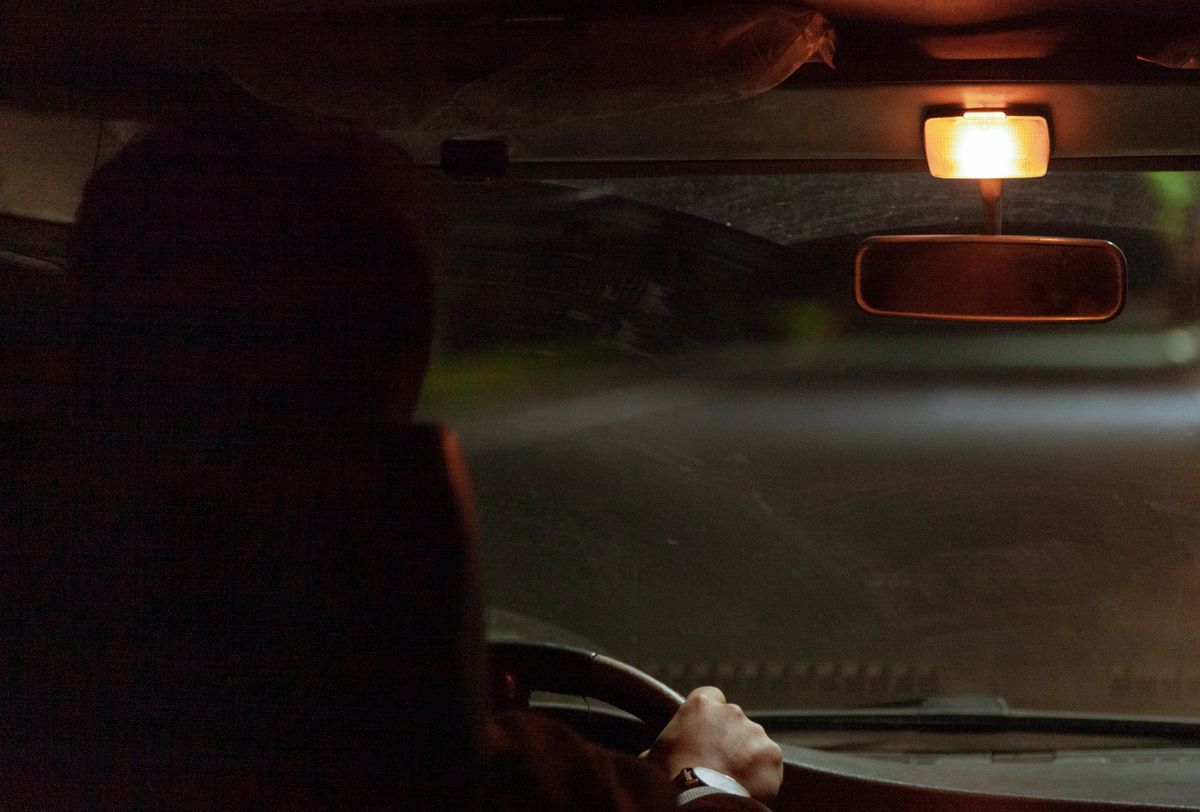 Person driving at night