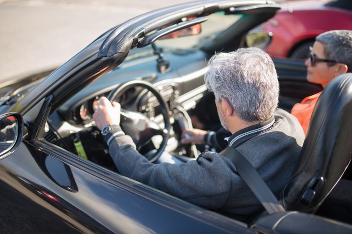 A man driving a car